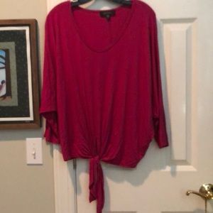 Tie front fuschia top. Roomy. Wide sleeves.